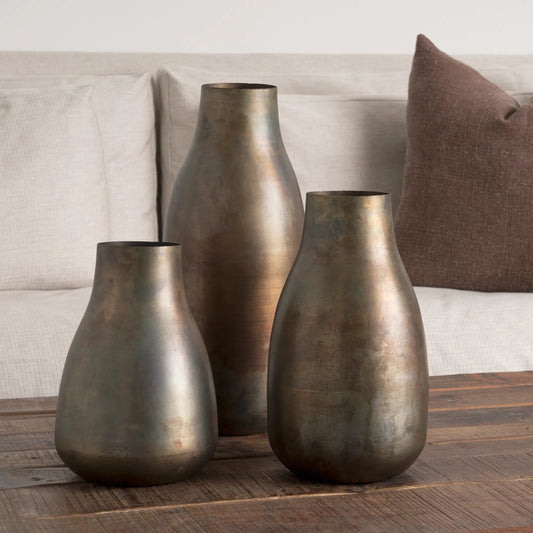 Devi Oxidized Vase by Mercana in gold. Made from metal in a rustic style.