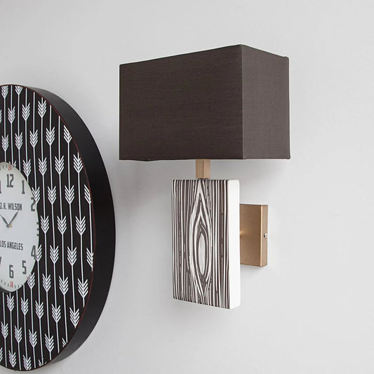 Maravilla Wall Sconce by Mercana in black. Made from ceramic in a modern style.