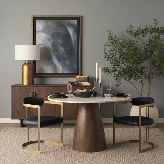 Hollyfield Leather Dining Armchair by Mercana. Made from metal in a traditional style.