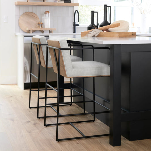 Stamford Fabric Stool by Mercana in beige, black. Made from wood in a transitional style.