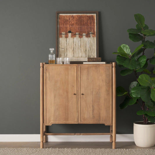 Phil Bar Cabinet by Mercana in light brown. Made from solid wood in a unique style.