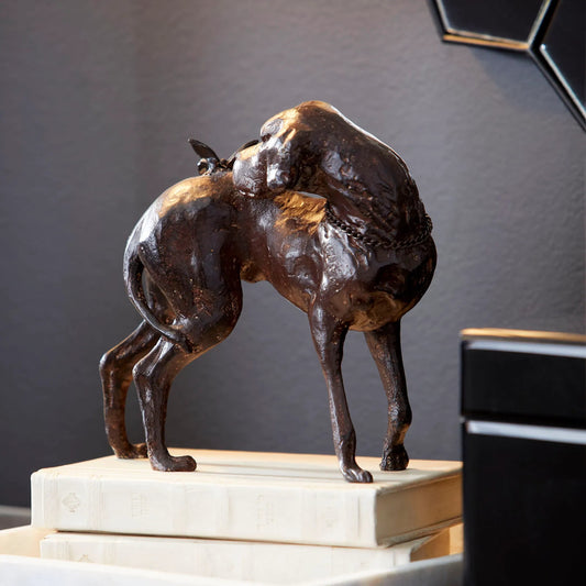 Dog and Butterfly by Cyan Design in rubbed red. Made from iron in a modern style.