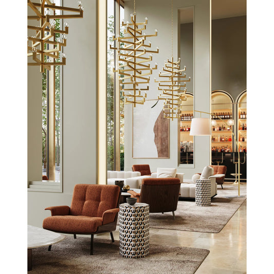 Andre Chandelier by Currey and Company in brass. Made from wrought iron in a modern style.