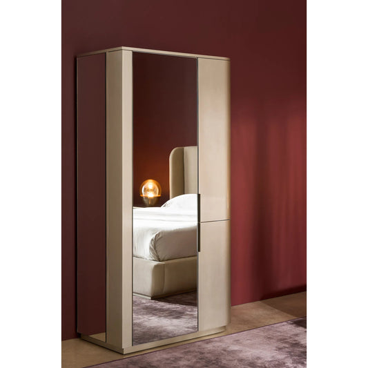 Oblique Armoire by Caracole in soft silver paint gloss, brushed whisper of gold. Made from unique in a modern style.