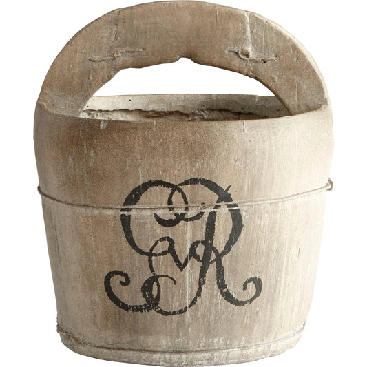 A Drop in the Bucket Planter by Cyan Design in ash brown. Made from cement in a cottage & farmhouse style.