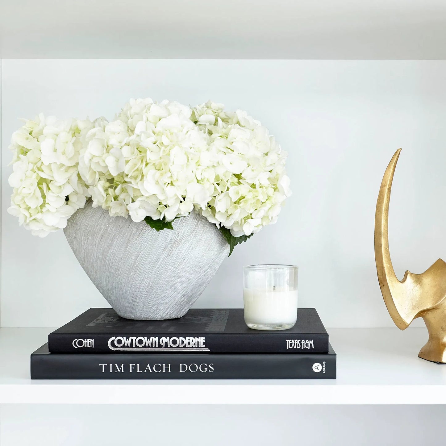 003 S-257286 | Lifestyle | Selena Vase by Cyan Design in natural stone. Made from ceramic in a modern style.
