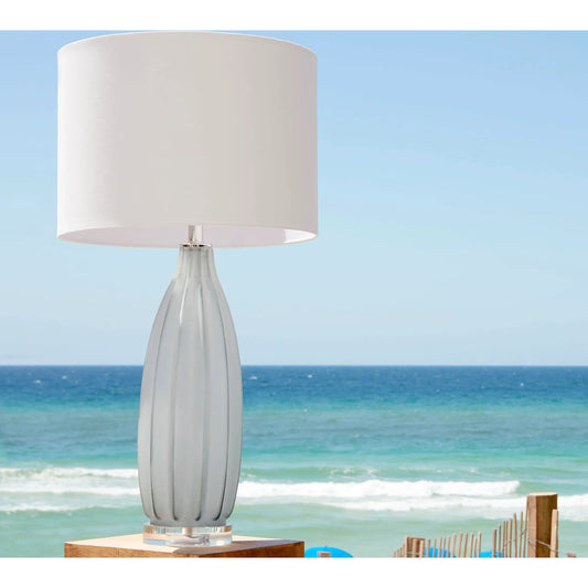 Blakemore Table Lamp by Cyan Design in gray. Made from glass with off white cotton shade in a modern style.