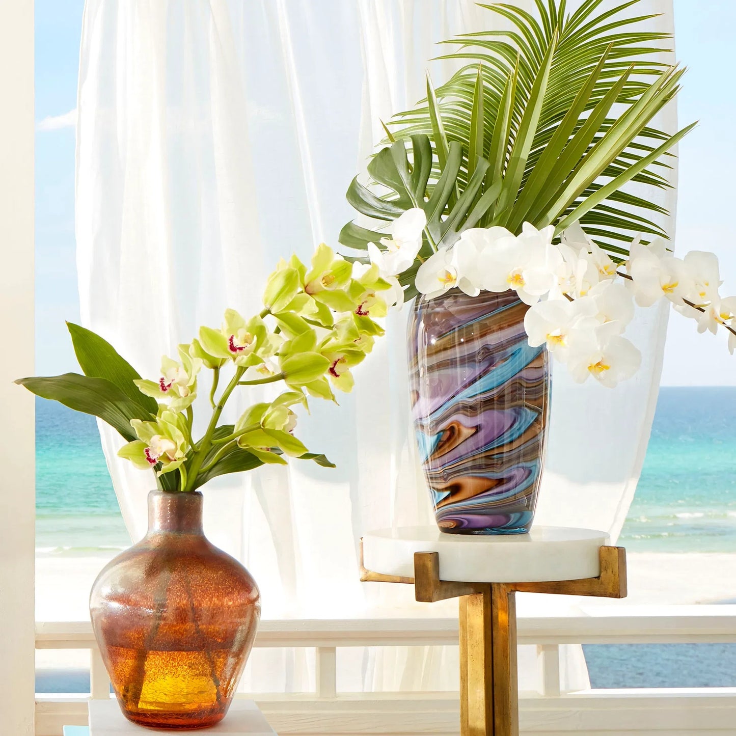 002 S-254747 | Lifestyle | Borealis Vase by Cyan Design in sky blue cafe swirl. Made from glass in a modern style.