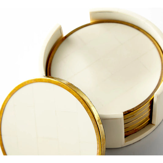 Gatsby Coasters by Cyan Design in brass, white. Made from resin, wood, brass in a modern style.