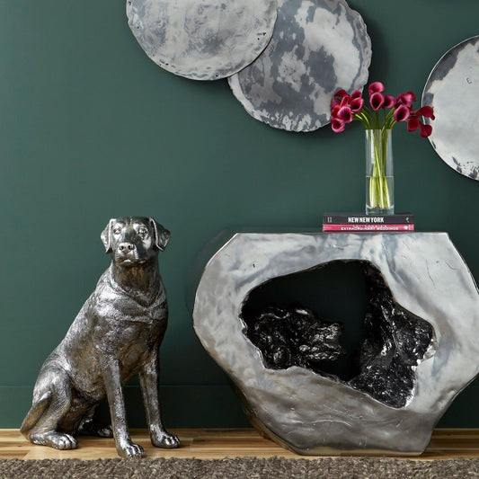 Labrador by Phillips Collection in silver and liquid silver. Made from resin in a transitional style.
