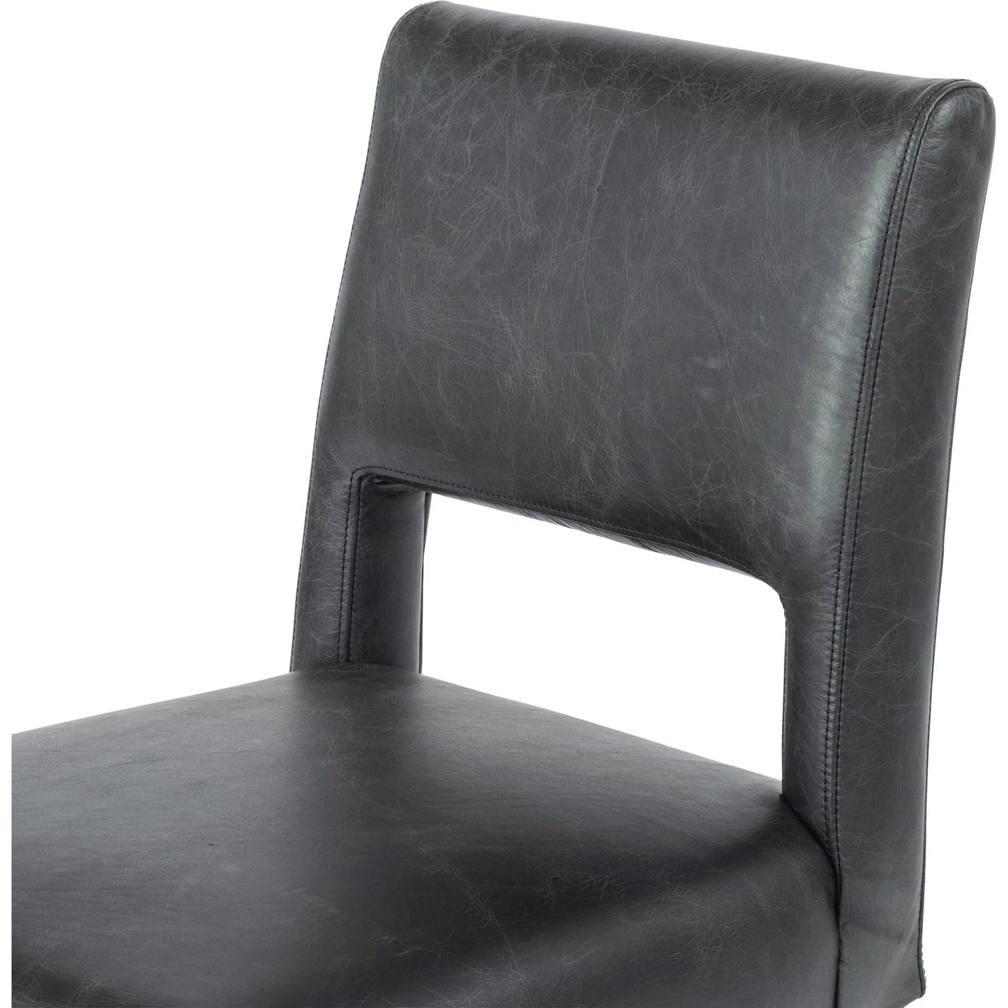 006 SI-2462029 | Closeup | Joseph Dining Chair by Four Hands in durango smoke, toasted oak. Made from top grain leather, solid oak in a traditional style.