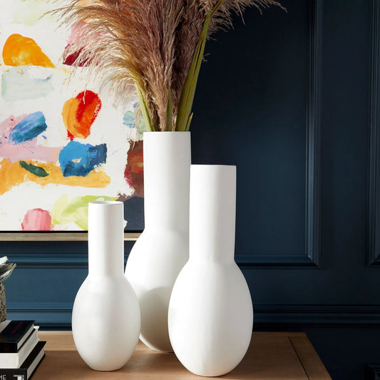 Impressive Impression Vase by Cyan Design in matte white. Made from ceramic in a modern style.