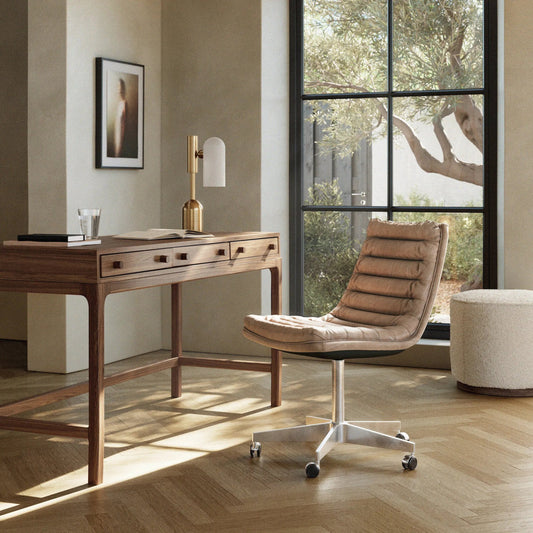 Malibu Desk Chair by Four Hands. Made from top grain leather, aluminum, 100% polyester in a modern style.