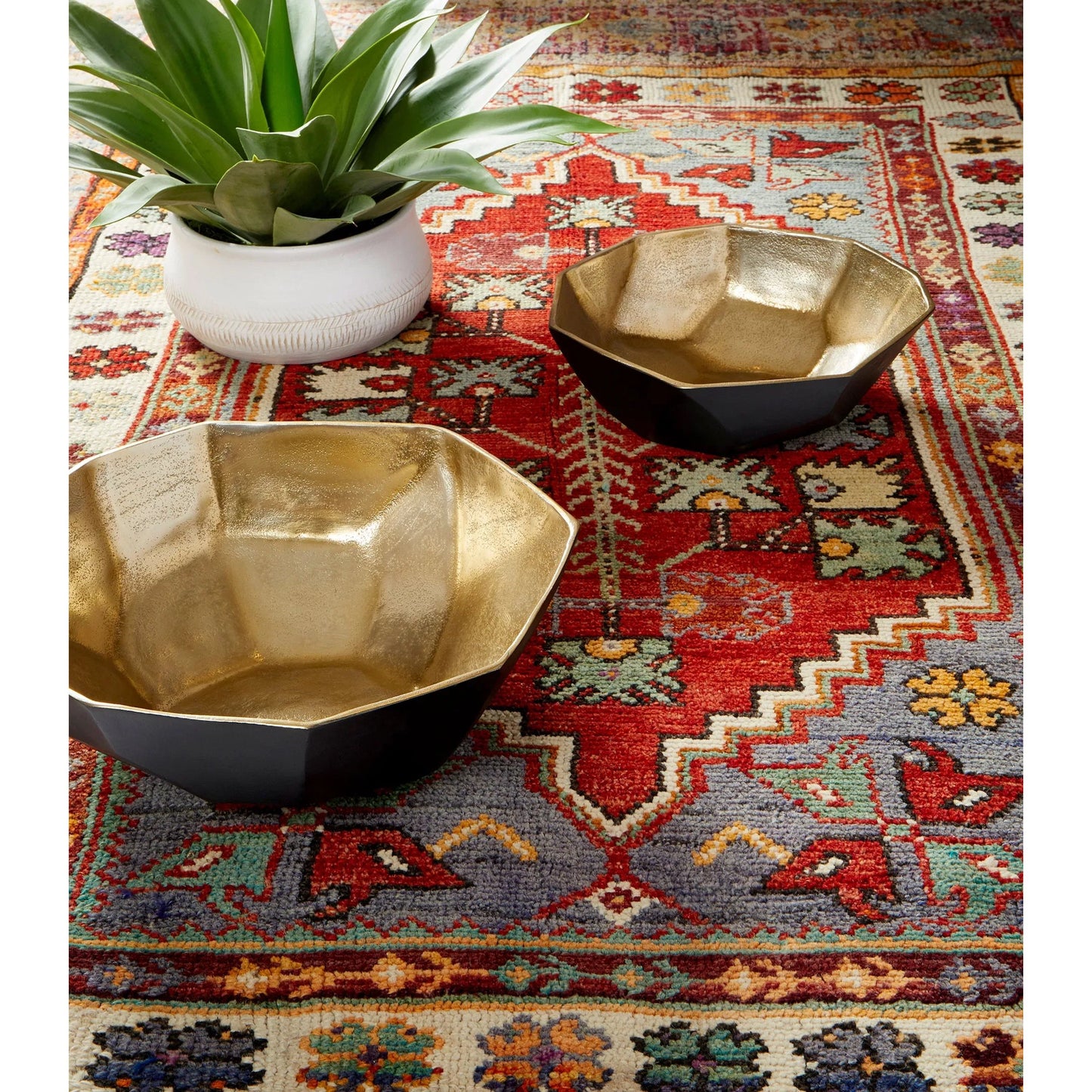 003 SR-778461 | Lifestyle | Radia Bowl by Cyan Design in matte black, gold. Made from aluminum in a modern style.