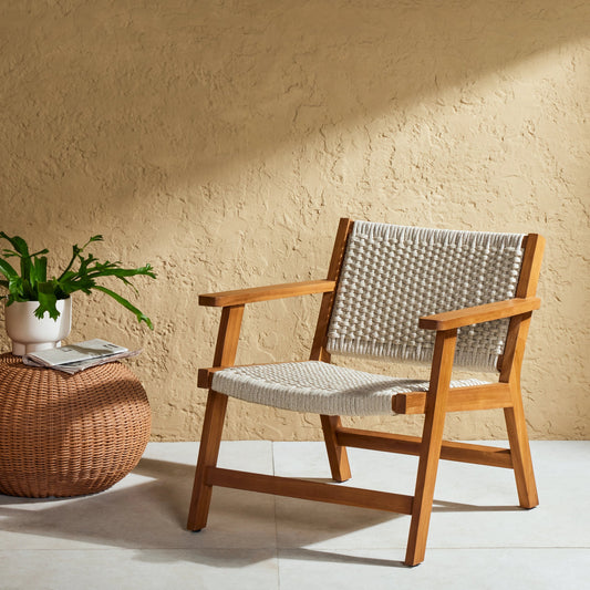 Delano Chair by Four Hands. Made from solid fsc®-certified teak, 100% polypropylene in a coastal style.