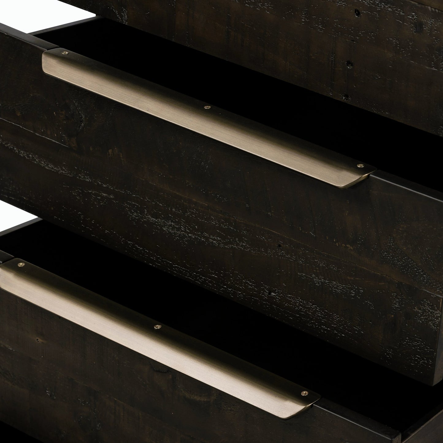003 SI-2158598 | Closeup | Wyeth 5 Drawer Dresser by Four Hands in dark carbon, antique brass and dark carbon. Made from solid reclaimed pine, iron in a rustic style.