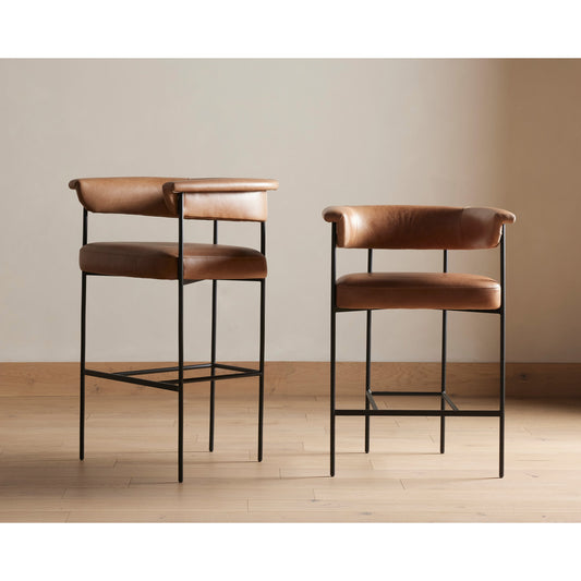 Carrie Bar Stool by Four Hands in matte black. Made from top grain leather, iron, 100% polyester in a transitional style.