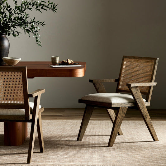 Flora Dining Chair by Four Hands in avant natural, drifted plank grey, natural cane. Made from 74% polyester, 26% acrylic, solid oak, cane in a coastal style.