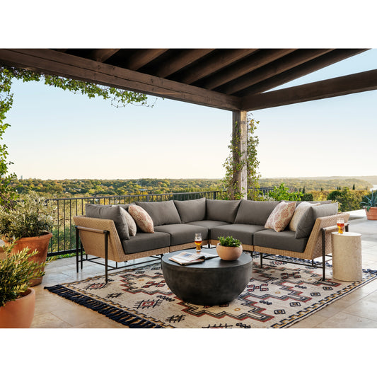 Basil Outdoor Round Coffee Table by Four Hands. Made from aluminum in a modern style.