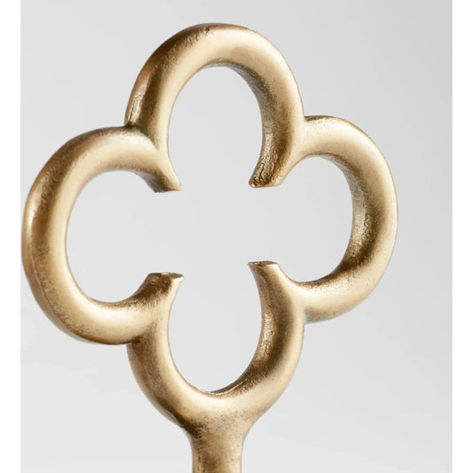 Folium Sculpture by Cyan Design in antique brass. Made from unique in a modern style.