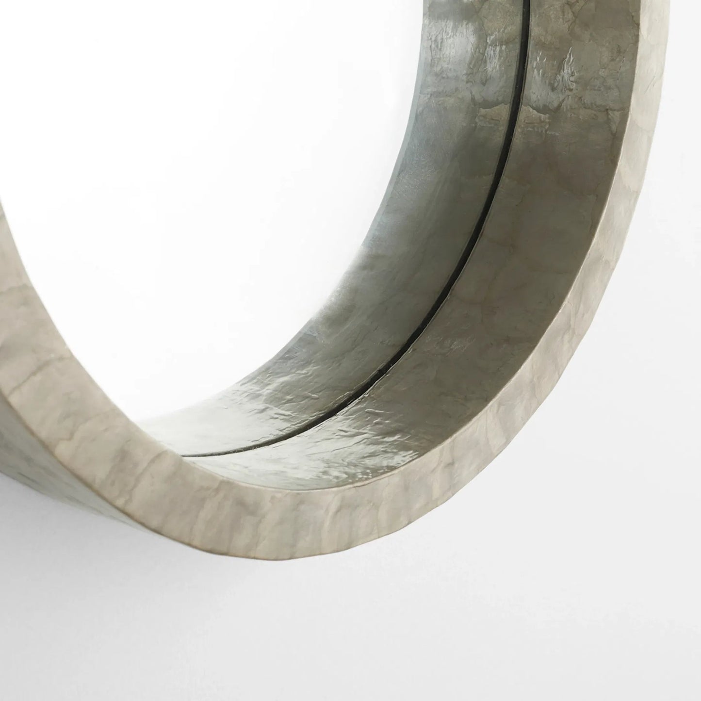 009 SI-1987433 | Closeup | Triton Round Mirror by Cyan Design. Made from capiz, wood, mirrored glass in a modern style.