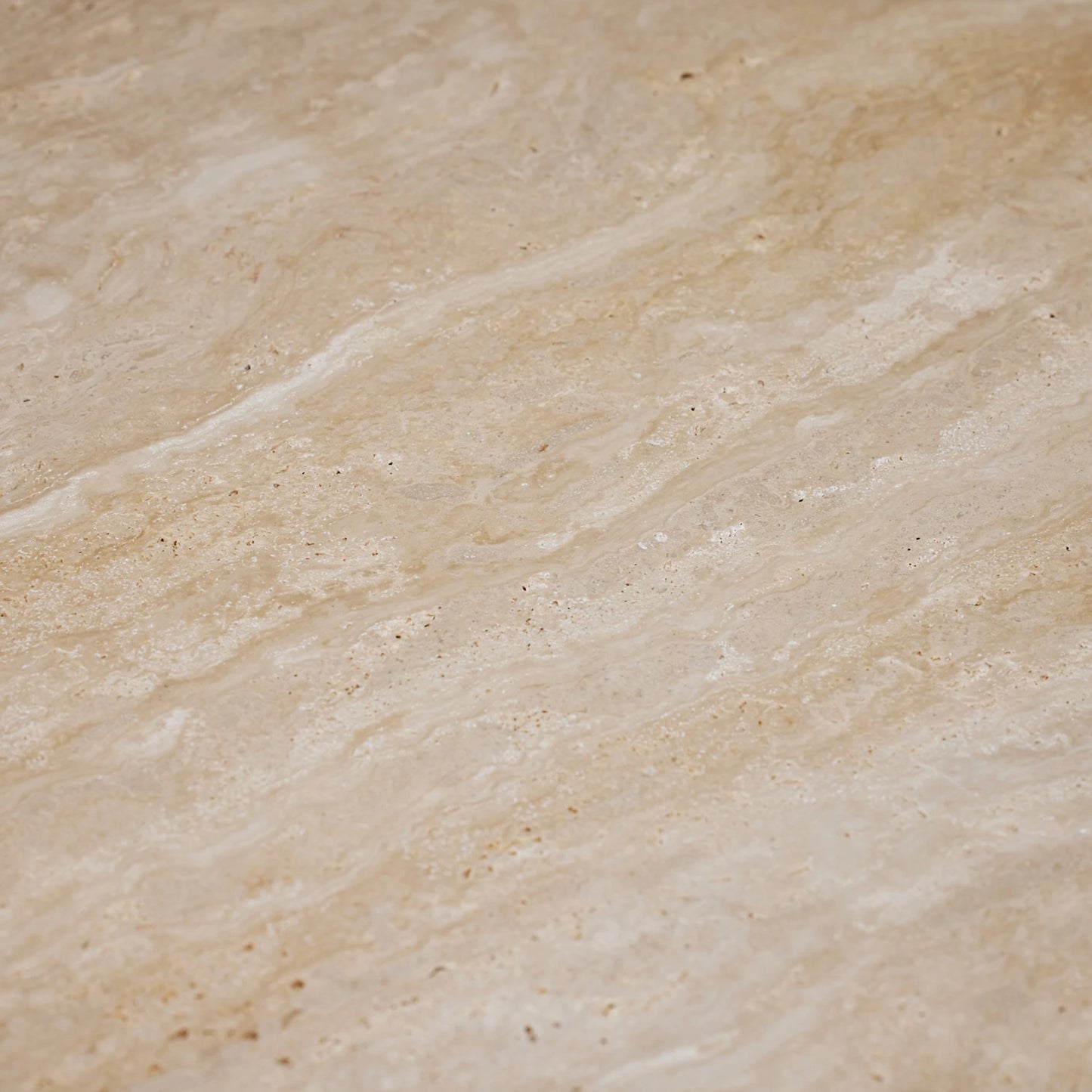 003 SI-2122622 | Closeup | Amerigo Cocktail Table by Interlude Home in raw travertine. Made from travertine in a modern style.