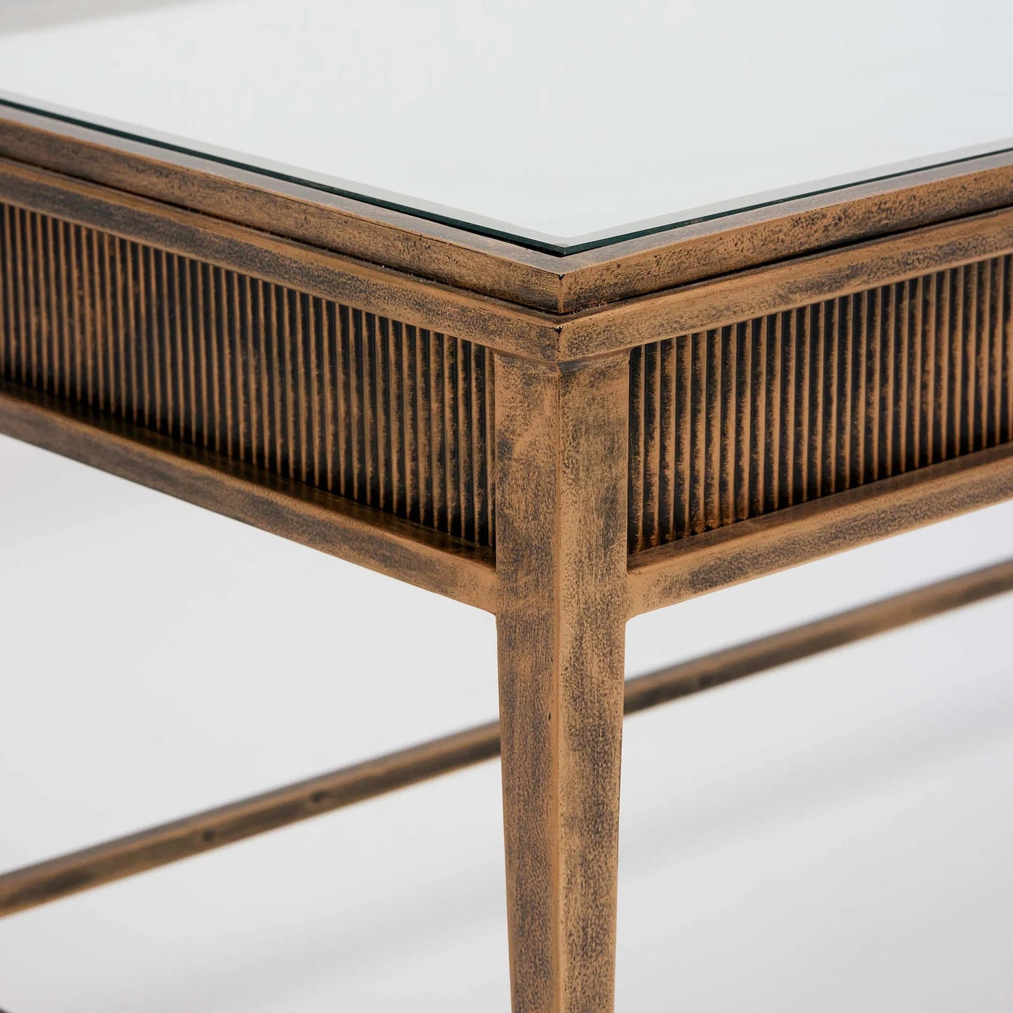 004 SI-2374501 | Closeup | Camille Cocktail Table by Interlude Home in gilded brass, clear. Made from iron, glass in a modern style.