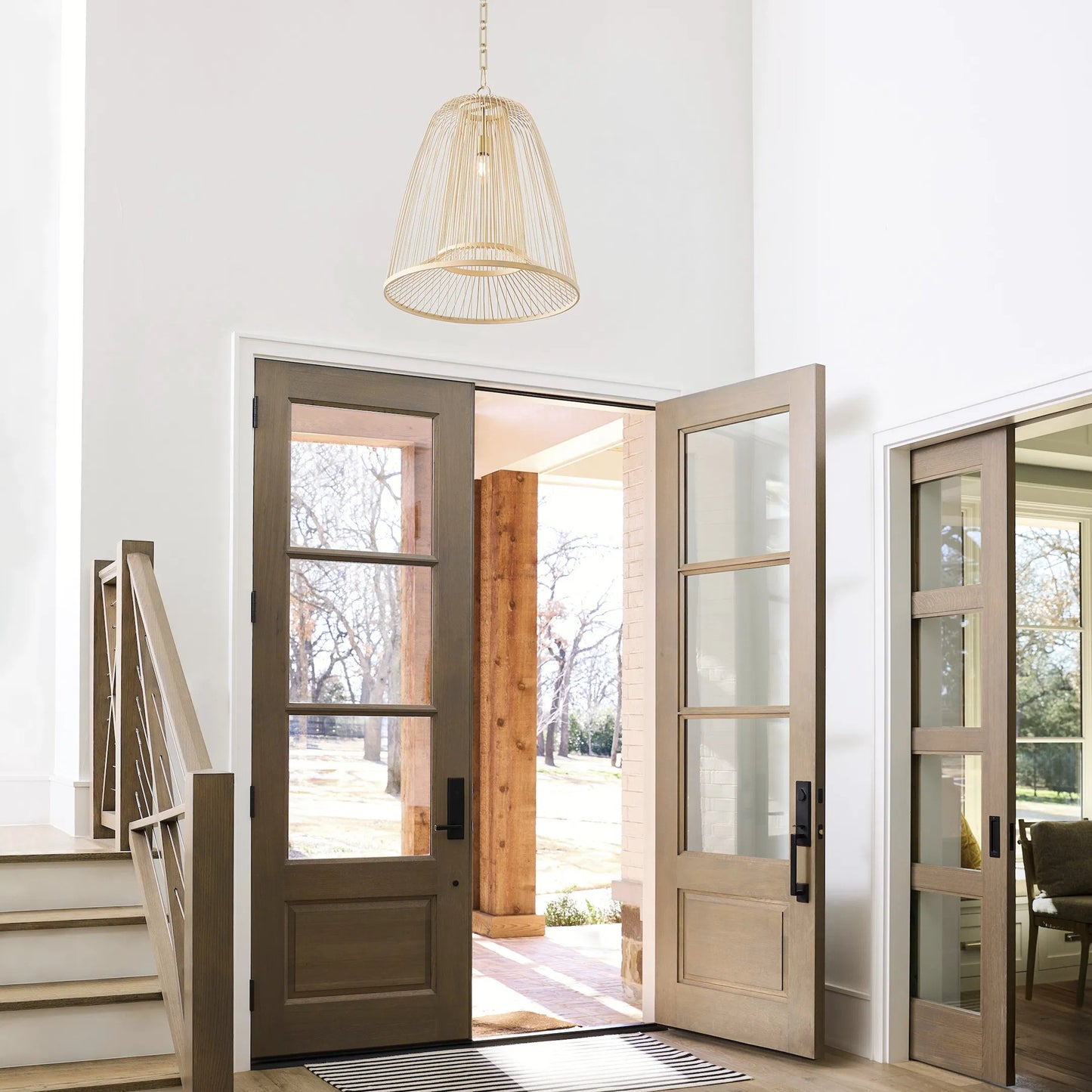 002 SI-2328800 | Lifestyle | Terrae Bell Pendant by Cyan Design in aged brass. Made from rattan, metal in a rustic style.