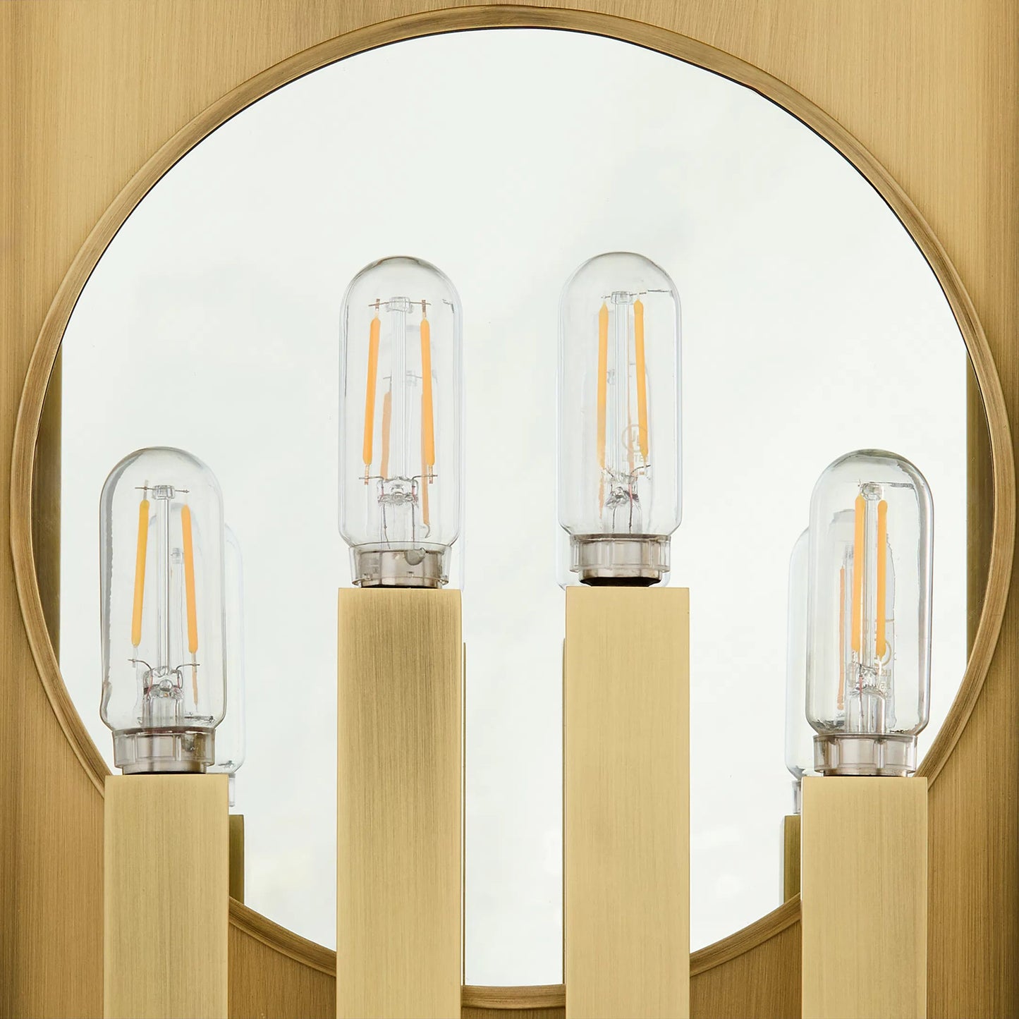 003 SI-2328622 | Closeup | Guilford 4 Light Outdoor Wall Sconce by Cyan Design in heritage brass. Made from brass, glass in a cottage & farmhouse style.