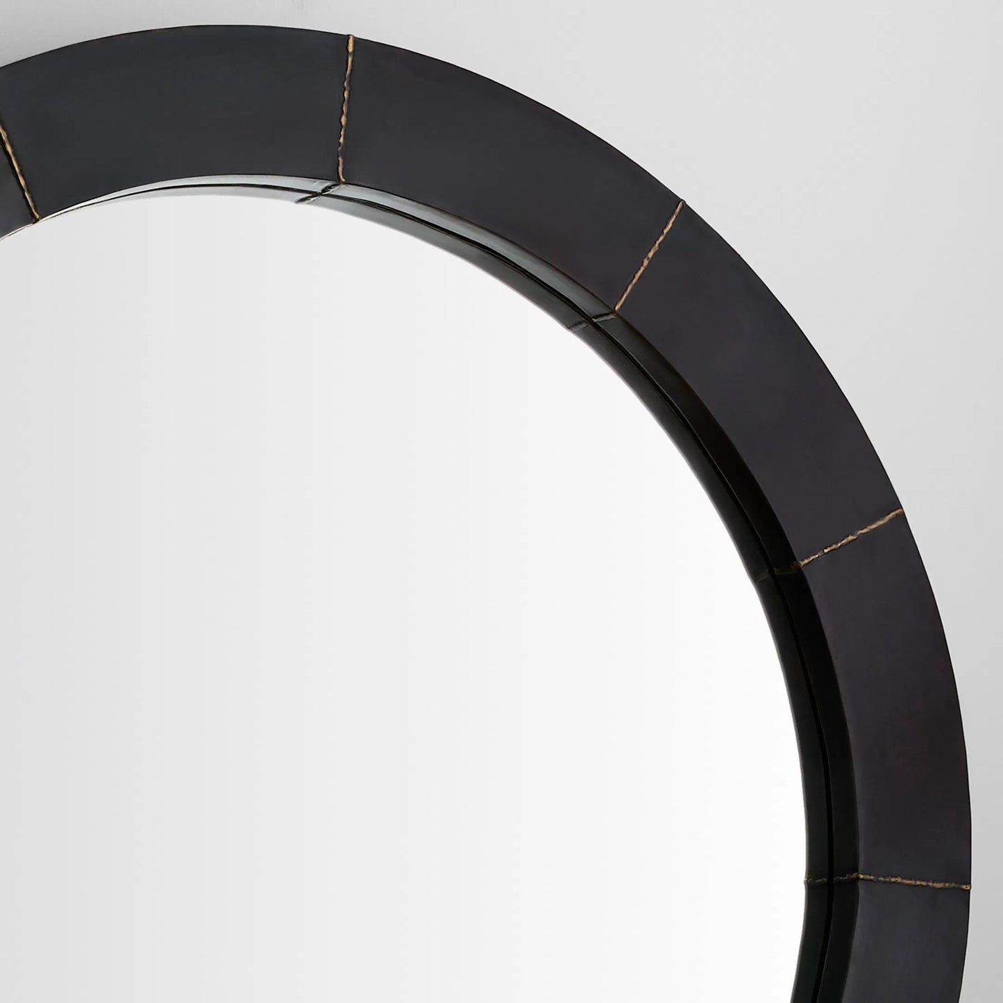 003 SI-2444880 | Closeup | Antara Mirror by Cyan Design in blackened bronze, antique brass. Made from steel in a transitional style.