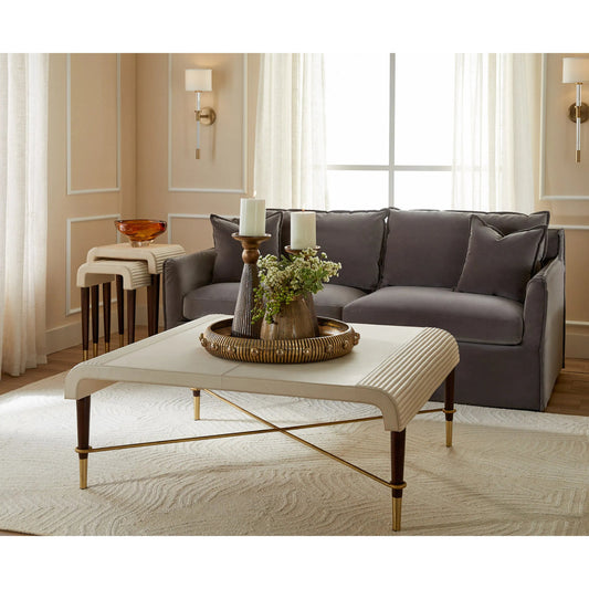 Channel Cocktail Table by Cyan Design in off white, walnut. Made from leather, mdf, brass in a transitional style.