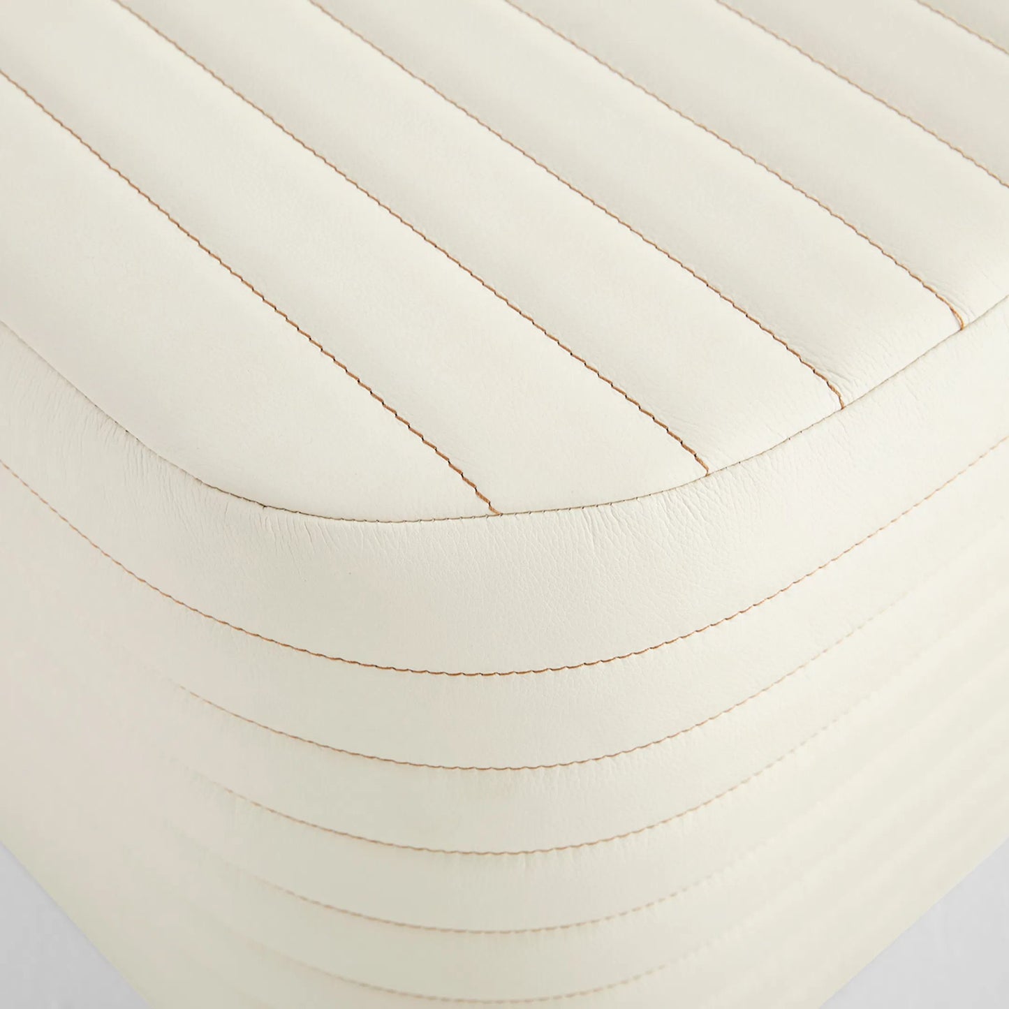 003 SI-2328576 | Closeup | Channel Ottoman by Cyan Design in off white. Made from leather, foam, mdf in a transitional style.