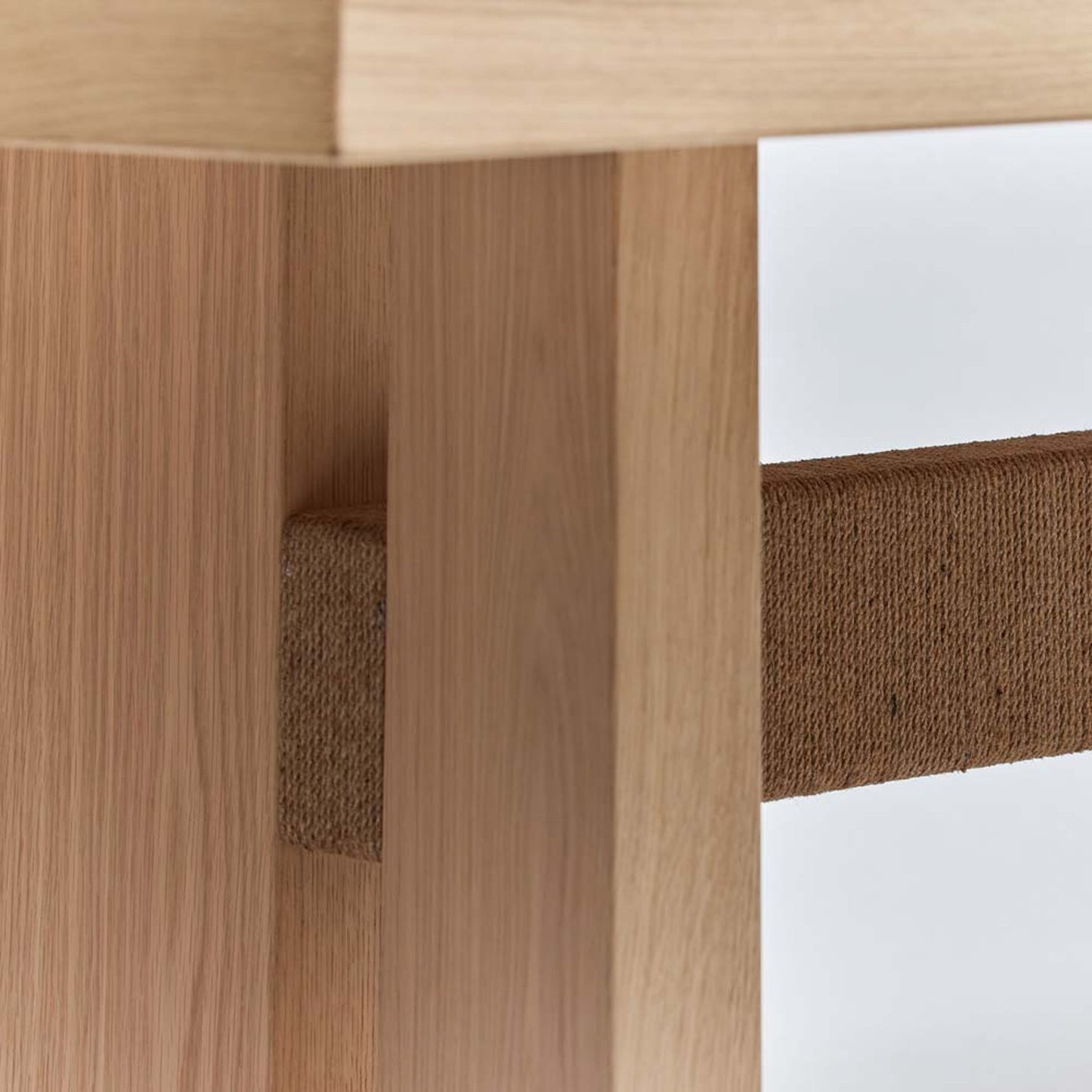 003 SI-2130783 | Closeup | Lummus Dining Table by Interlude Home in saddle, natural jute. Made from oak, jute in a modern style.