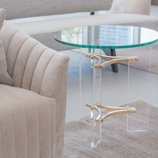 Tamara Side Table by Interlude Home in clear, polished brass. Made from acrylic, glass, stainless steel in a modern style.