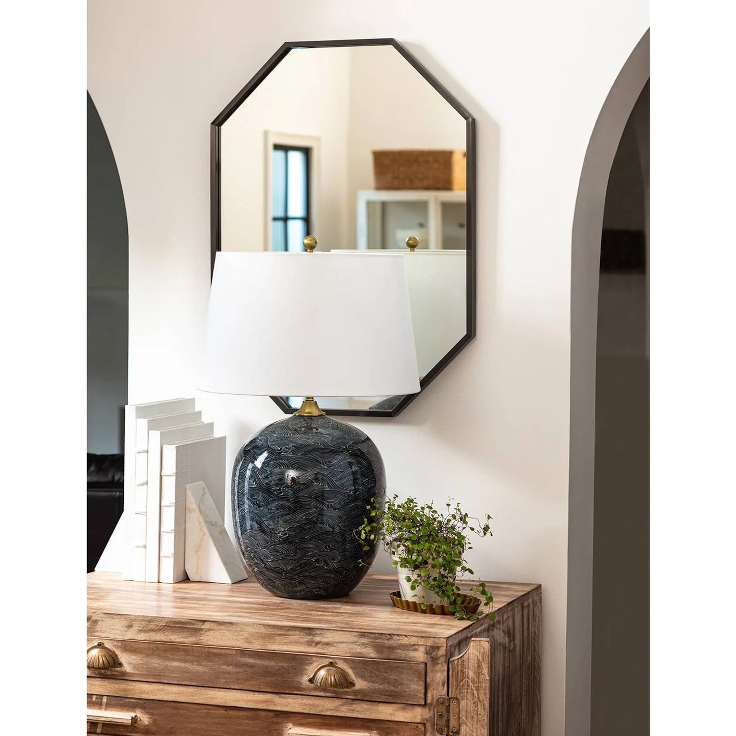029 SR-769953 | Lifestyle | Harbor Ceramic Table Lamp by Regina Andrew in black and ebony. Made from ceramic in a modern style.