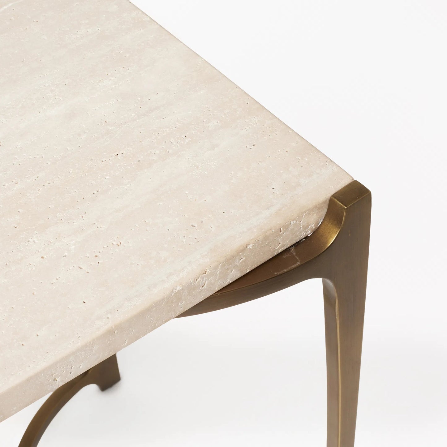 003 SI-2519562 | Closeup | Beaumont Console by Interlude Home in raw travertine, golden bronze. Made from travertine, metal in a transitional style.