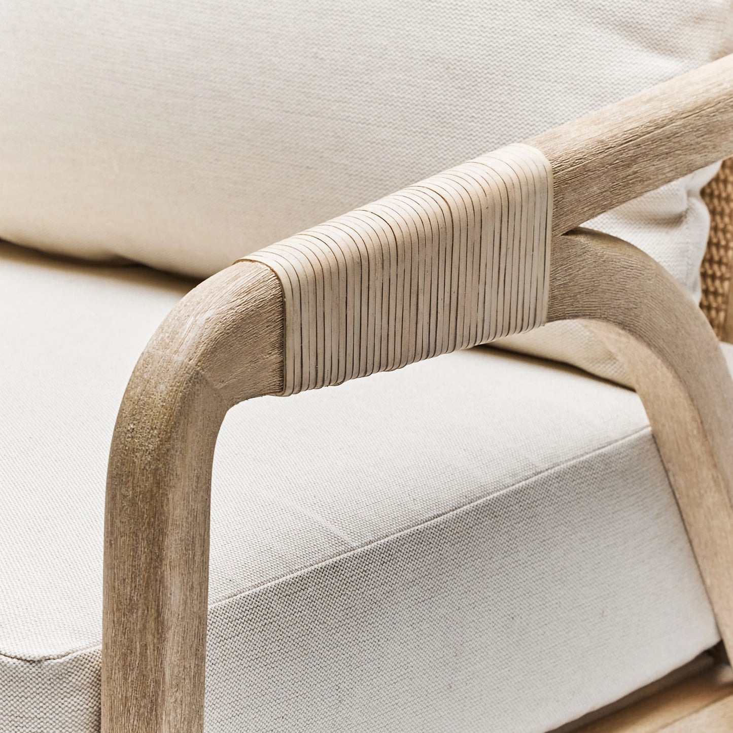 004 SI-2122847 | Closeup | Delray Lounge Chair by Interlude Home in white ceruse, off white, natural. Made from mahogany, rattan, leather, flax weave in a modern style.