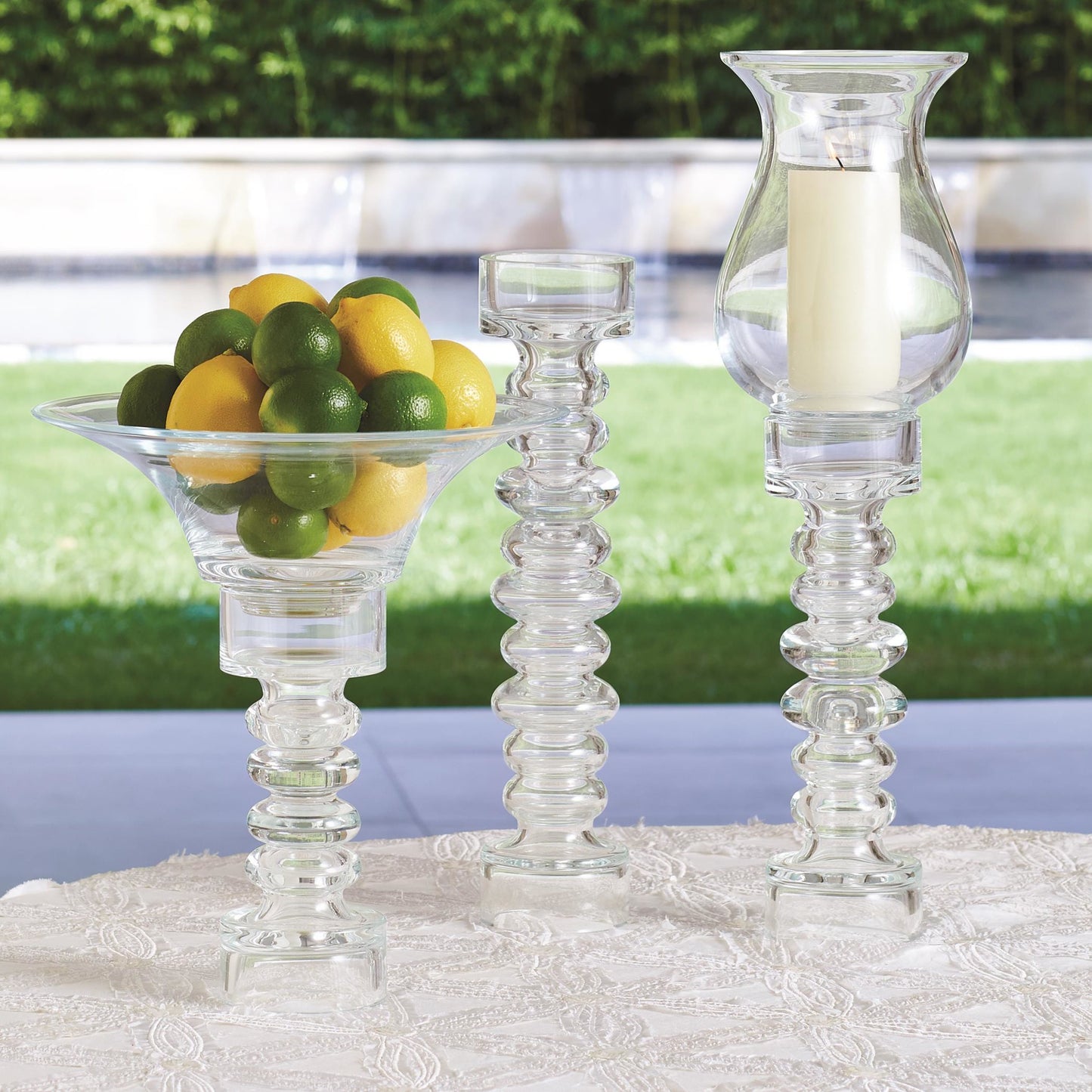 004 SR-701324,SR-892067 | Lifestyle | Glass Ribbed Candleholder by Global Views. Made from glass in a transitional style.