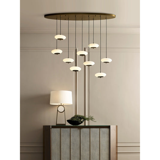 Collier Chandelier by Wildwood in antique brass, black, milk. Made from unique in a modern style.