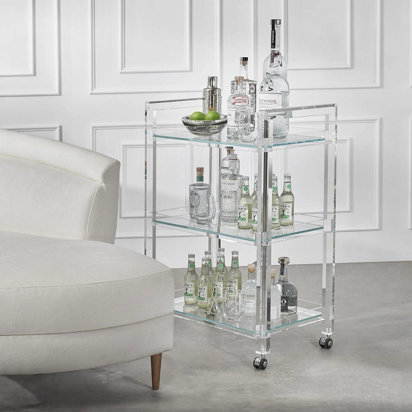 005 S-245917 | Lifestyle | Ava Bar Cart by Interlude Home in clear. Made from acrylic, glass in a modern style.
