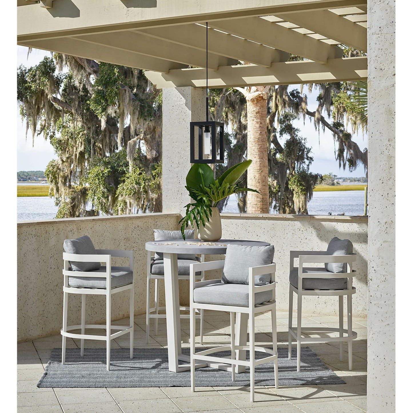 002 SI-1759207 | Lifestyle | Montecito Outdoor Lantern by Regina Andrew in black. Made from iron in a modern style.