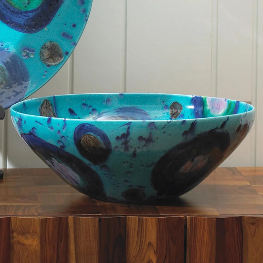 Blue Spots Bowl by Global Views in blue. Made from ceramic in a coastal style.