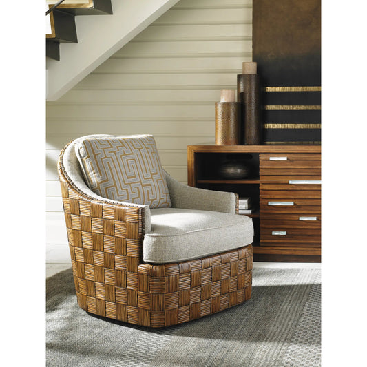 Nagano Swivel Chair by Tommy Bahama Home in brown. Made from rattan, fabric in a coastal style.