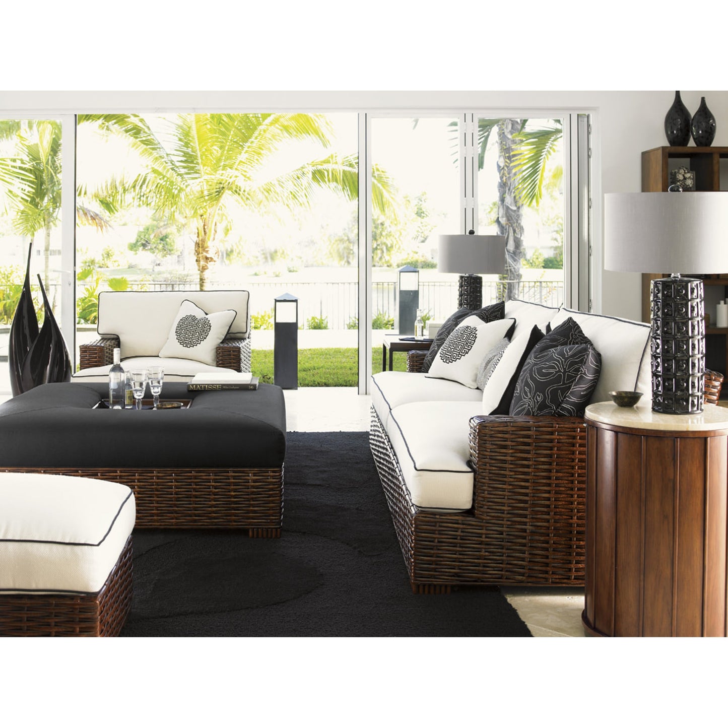005 SR-836102 | Lifestyle | Fiji Drum Table with Stone Top by Tommy Bahama Home. Made from unique in a rustic style.
