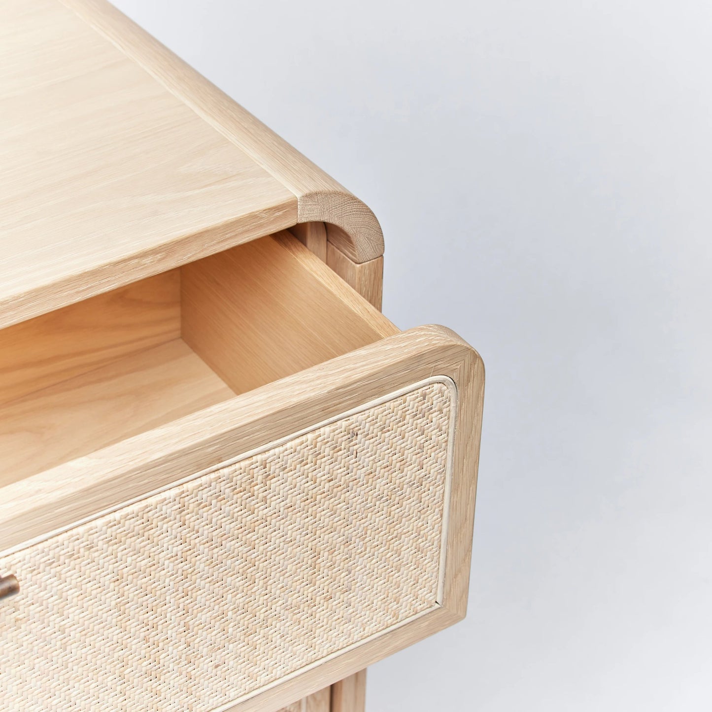 005 SI-2130786 | Closeup | Marsh 3 Drawer Chest by Interlude Home in pale natural, blonde, dark antique bronze. Made from oak, rattan, metal in a cottage & farmhouse style.