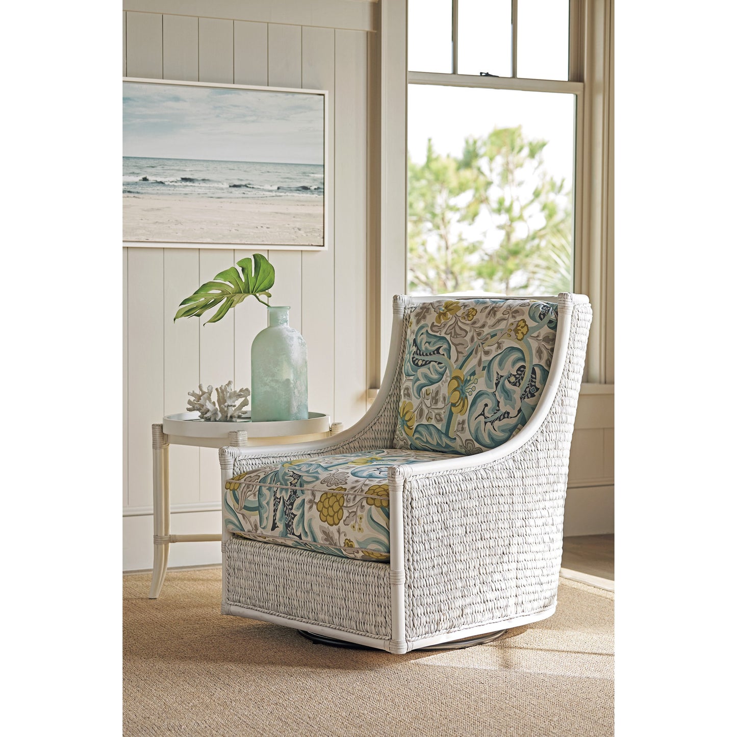003 SR-836352 | Lifestyle | Preston Swivel Chair by Tommy Bahama Home in caribbean sands. Made from unique in a coastal style.
