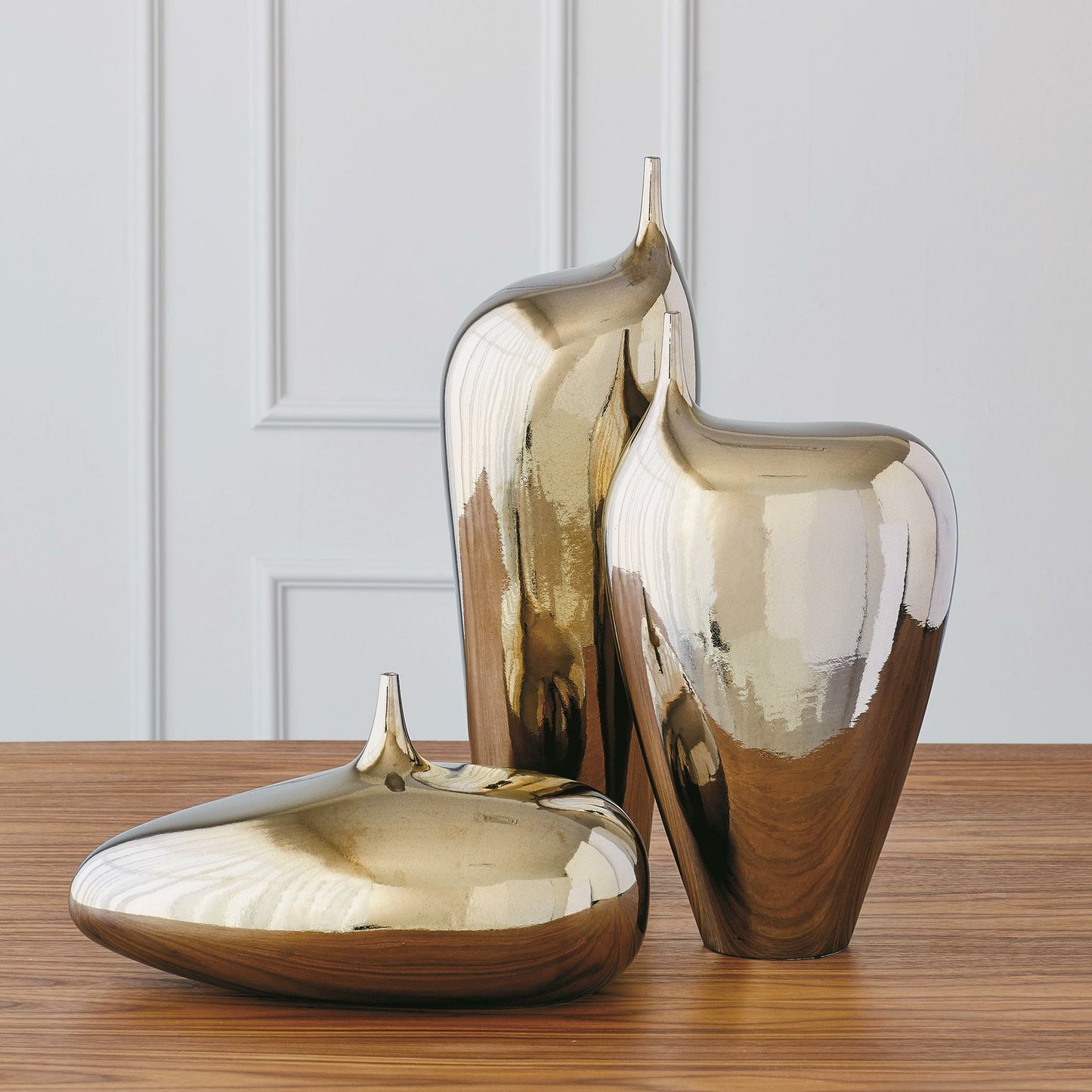 005 SR-827907,SR-827908,SR-827909 | Lifestyle | Offset Neck Object by Global Views in bronze crackle. Made from earthenware in a modern style.