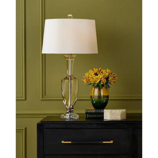 Classico Table Lamp by Currey and Company in clear, natural brass. Made from optic crystal, metal in a modern style.