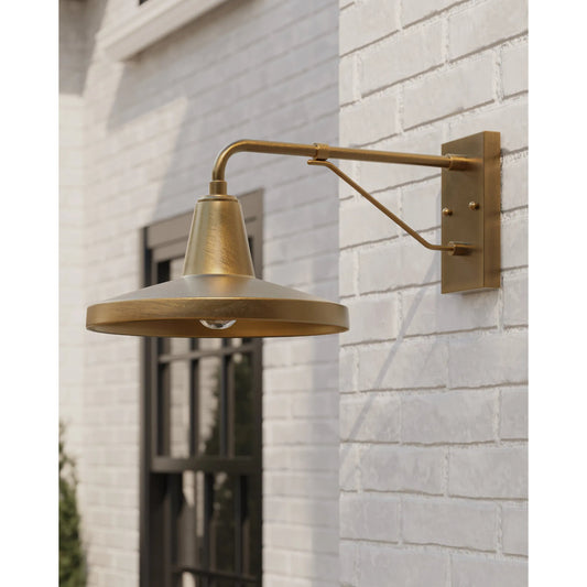 Mariner Outdoor Wall Sconce by Currey and Company. Made from brass in a modern style.