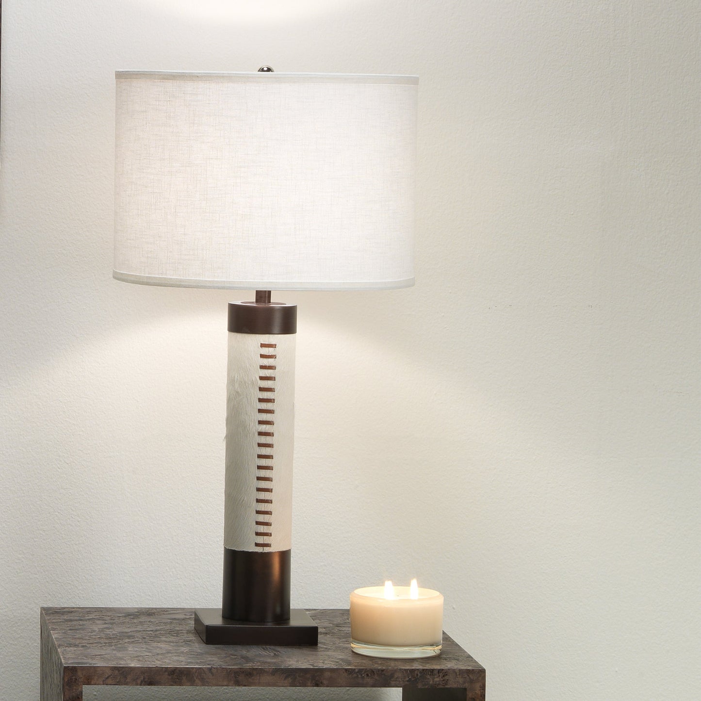 005 SI-1822229 | Lifestyle | Sheridan Table Lamp by Jamie Young in white hide & oil rubbed bronze metal. Made from hide, metal in a modern style.